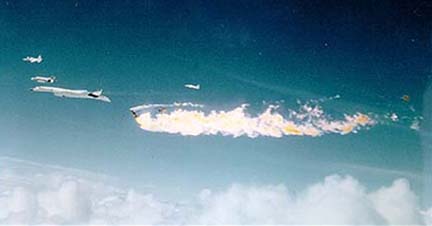 Seconds after the midair collision of Joe Walker's F-104N and Al White and Carl Cross's XB-70A. Note the stablizers are missing from the XB-70. At this point its crew was unaware of the midair collision.